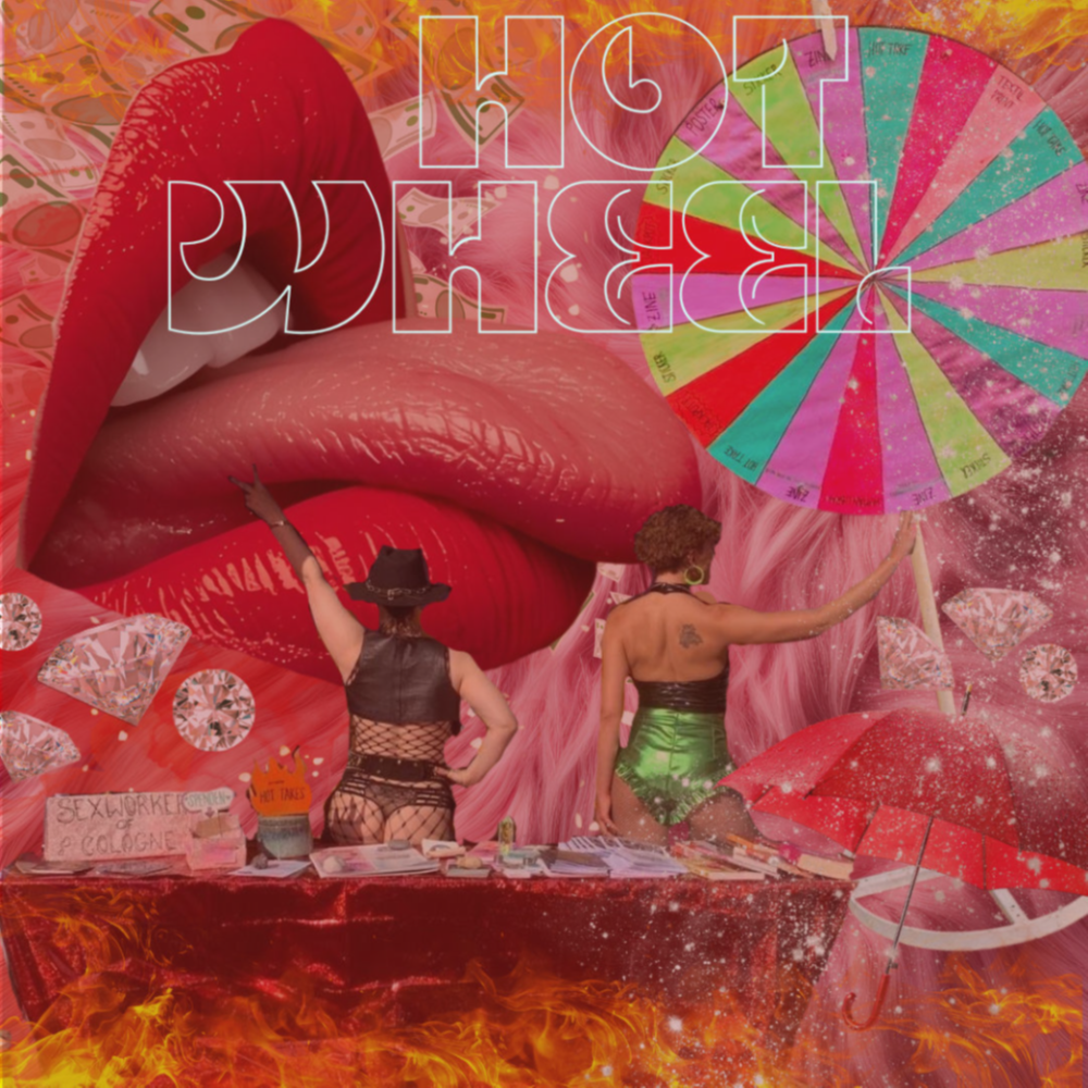 Zwei Frauen in Kostümen drehen ein buntes Preisrad an einem Tisch, mit großen Lippen, Flammen und funkelnden Diamanten im Hintergrund.